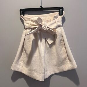 Aritzia - Pleated Shorts in Cream